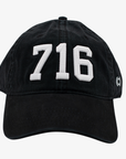 Black cap with '716' embroidered on a white background
