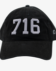 Black cap with '716' embroidered on a white background