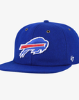 '47 Brand Buffalo Bills royal blue flat brim hat with embroidered charging buffalo logo, wool-like textured crown, and brass-colored eyelets.
