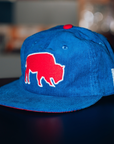 The Killers x The BFLO Store royal blue corduroy snapback hat with red standing buffalo embroidery and flat brim