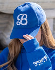 "B" With Buffalo City Seal Smiley Face Royal Cap