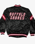Back view of Starter Buffalo Sabres black satin varsity jacket featuring large white BUFFALO SABRES lettering outlined in red and black, striped sleeves, and matching rib-knit trim.