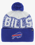 '47 Brand Buffalo Bills royal blue and cream-white knit pom beanie featuring oversized BILLS lettering, embroidered charging buffalo logo on a blue cuff, and matching blue yarn pom.
