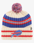 '47 Brand Buffalo Bills cream knit pom hat featuring royal blue and red horizontal stripes, embroidered charging buffalo logo on striped cuff, and multicolored yarn pom.