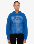New Era Women's Buffalo Bills royal blue pullover hoodie with tonal Bills script lettering, faded wash effect, charging buffalo logo, and front kangaroo pocket.