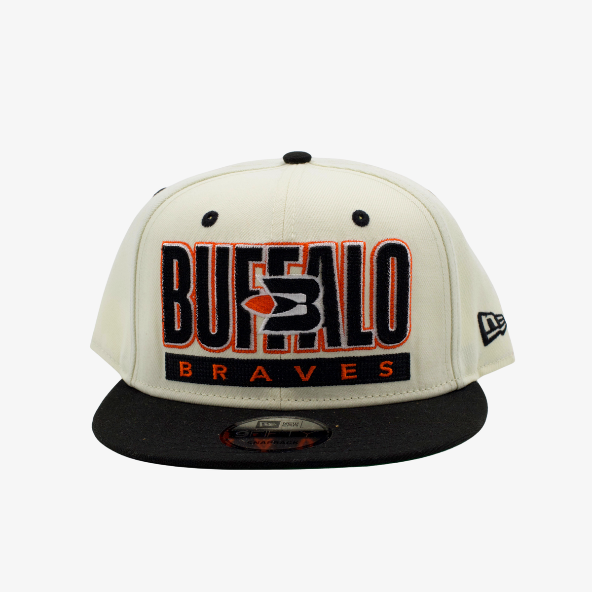 New Era Buffalo Braves cream and black 9FIFTY snapback hat featuring embroidered BUFFALO lettering, retro Braves logo, orange accents, and black flat visor.