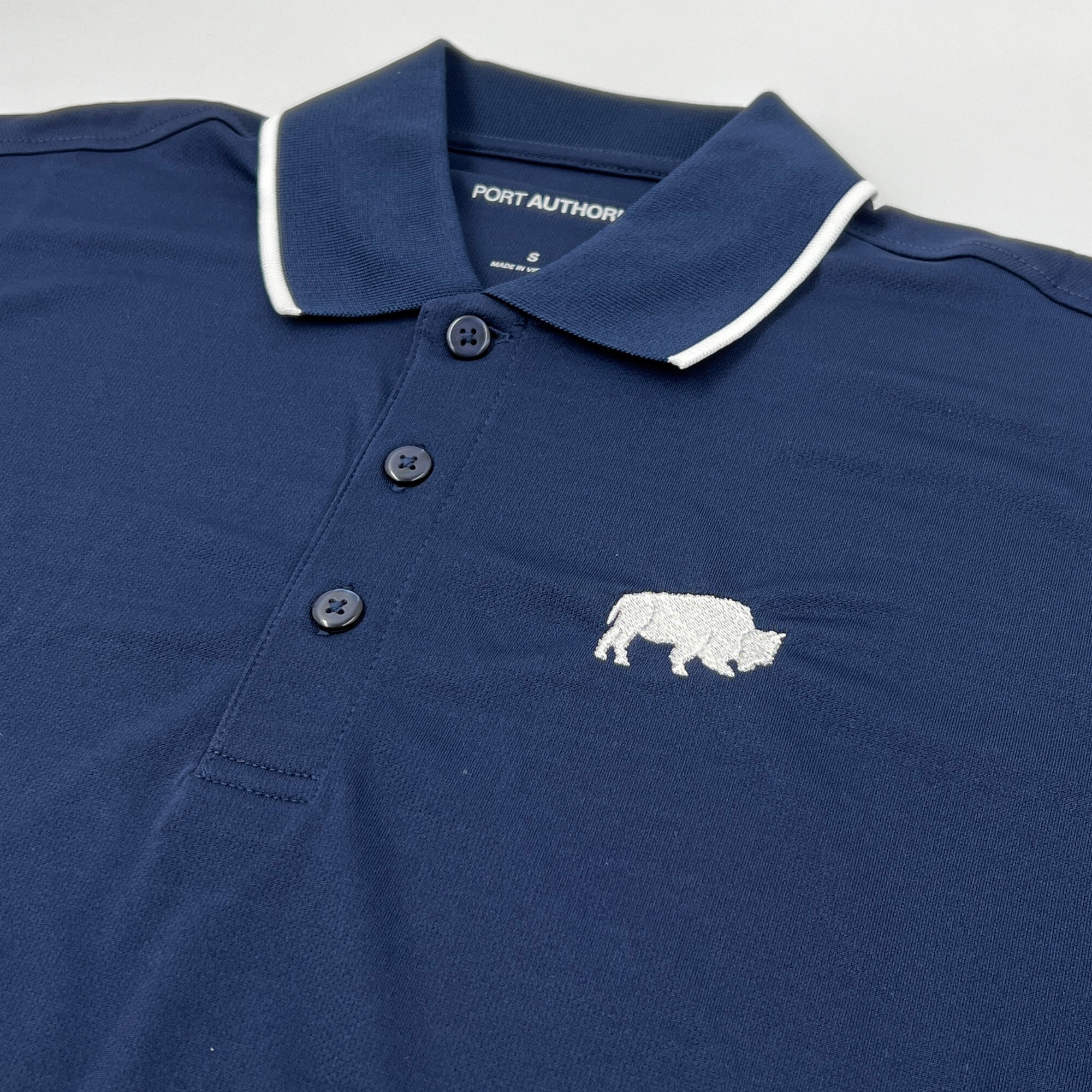 BFLO Navy With Embroidered Buffalo Dry Fit Polo