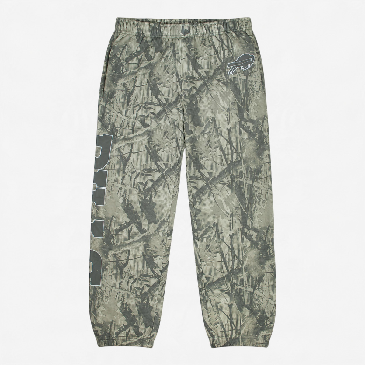 Buffalo Bills woodland camouflage jogger pants featuring an allover green and gray tree branch pattern, vertical BILLS wordmark down the leg, charging buffalo logo, elastic waistband, and ankle cuffs.
