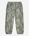 Buffalo Bills woodland camouflage jogger pants featuring an allover green and gray tree branch pattern, vertical BILLS wordmark down the leg, charging buffalo logo, elastic waistband, and ankle cuffs.
