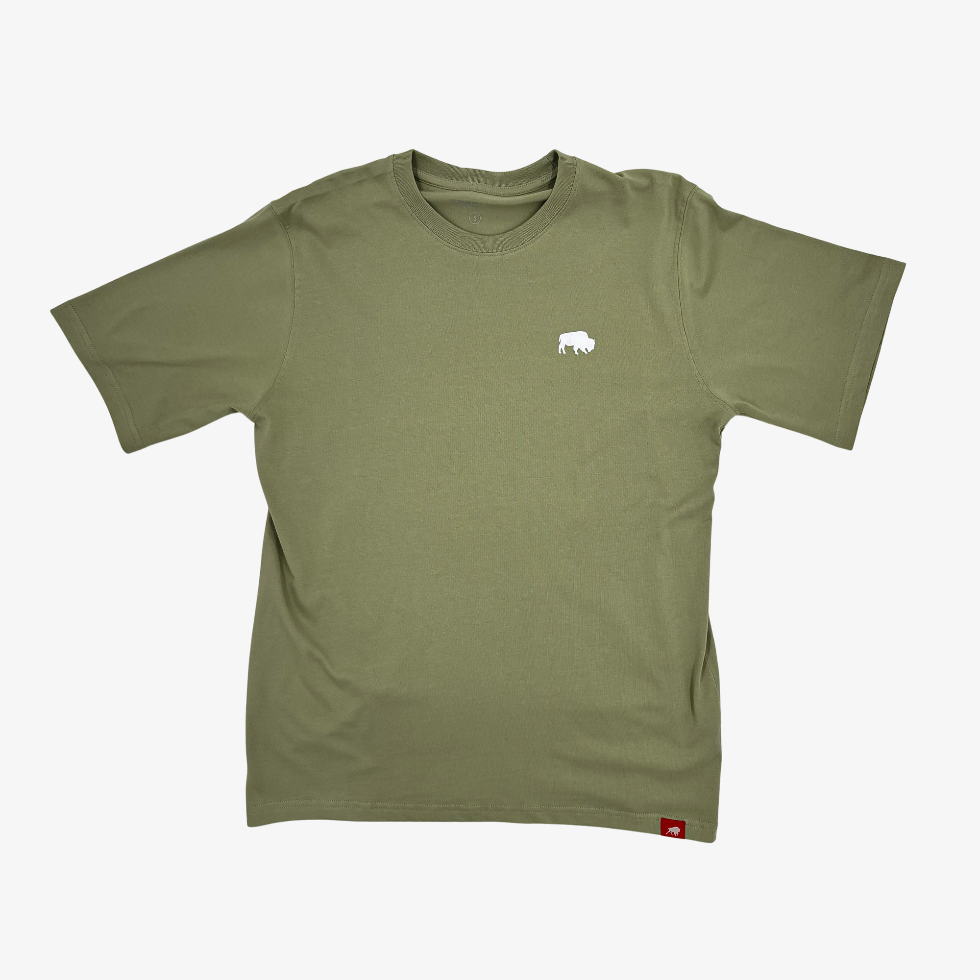 An olive green short-sleeve t-shirt with a small white bison logo on the left chest and a small red tag on the bottom hem, displayed flat against a light gray background.