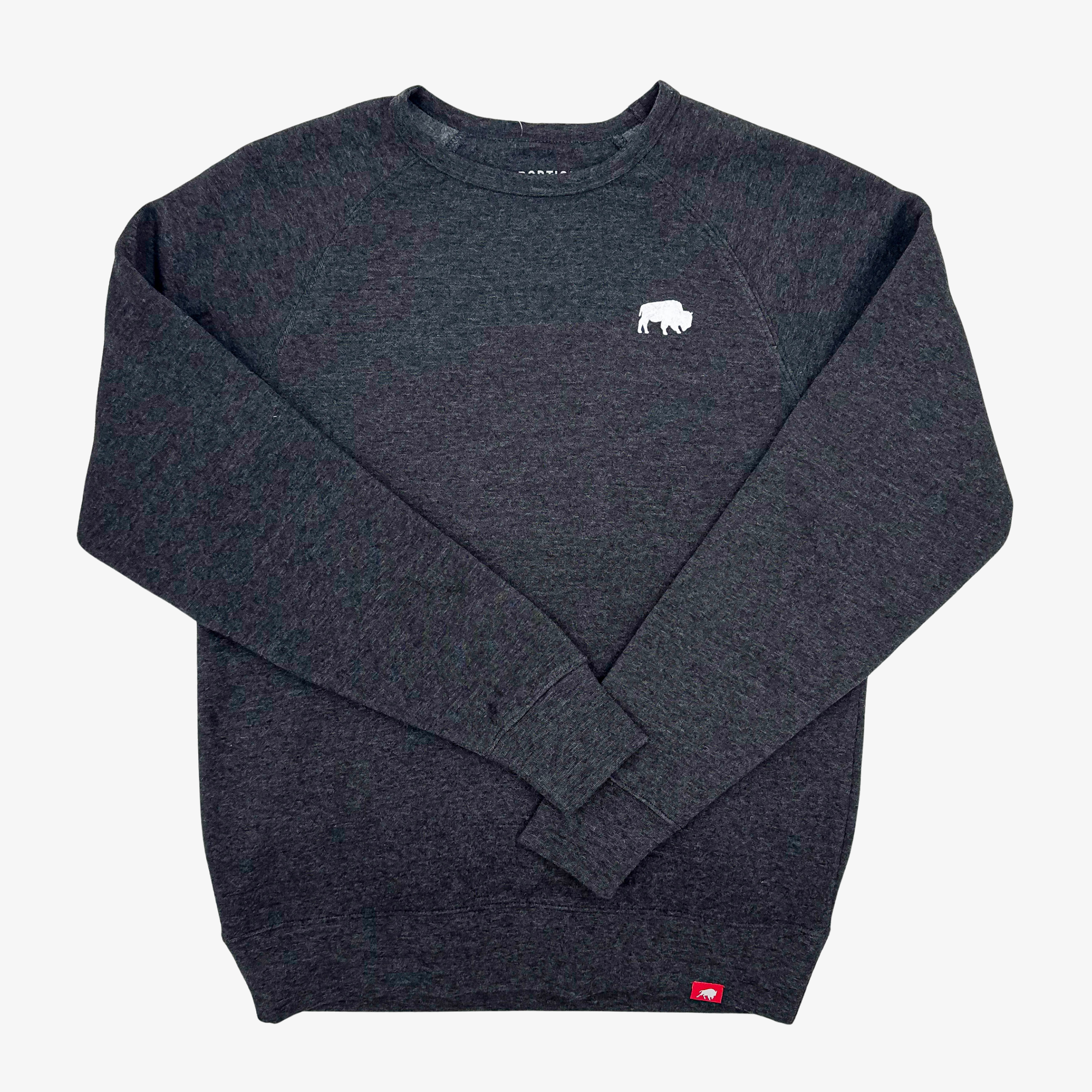 A dark heather black crewneck sweatshirt with a small white rhinoceros logo on the left chest and a small red tag near the bottom hem, displayed on a light gray background.