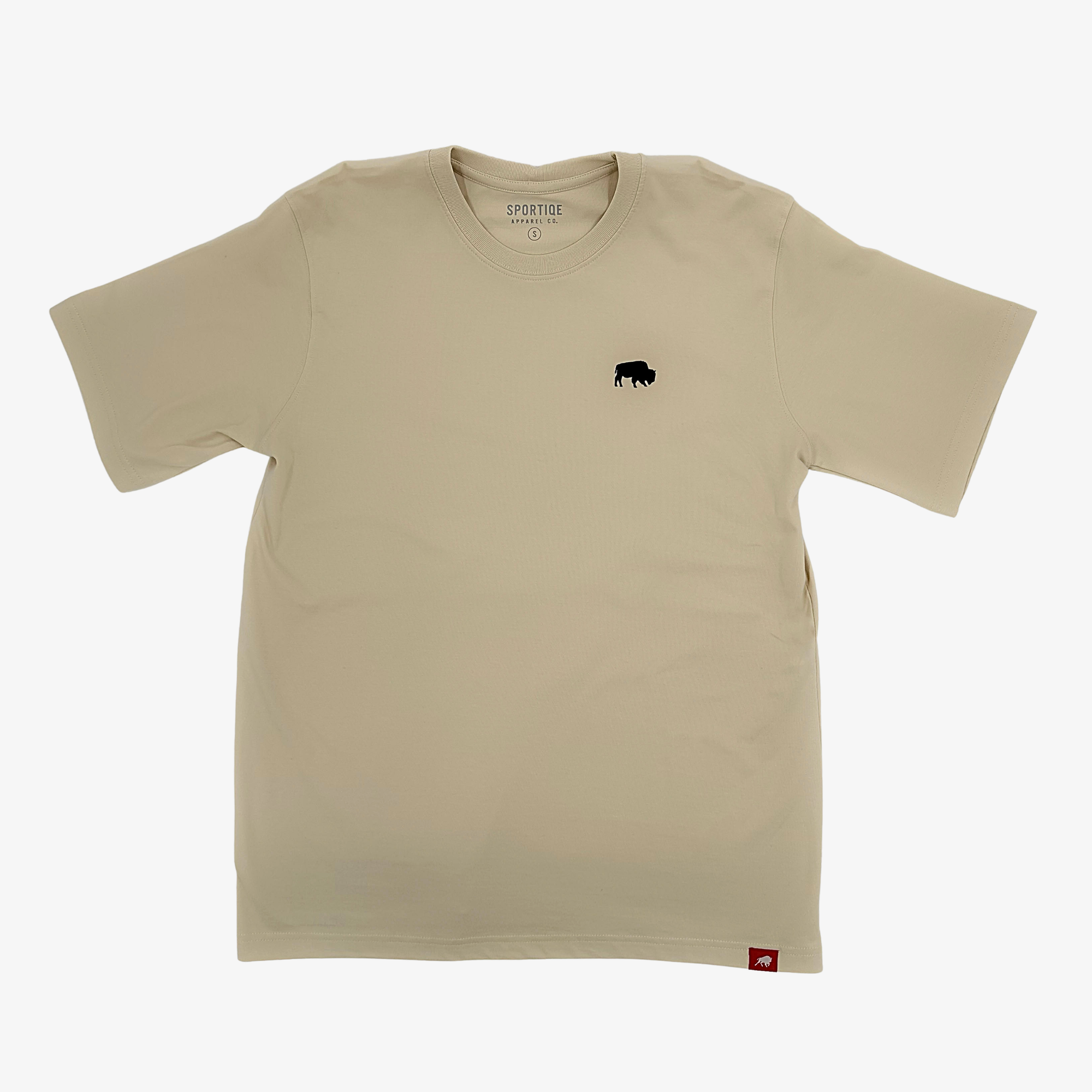 A beige crewneck t-shirt with a small black bison graphic on the left chest, displayed flat against a light gray background.