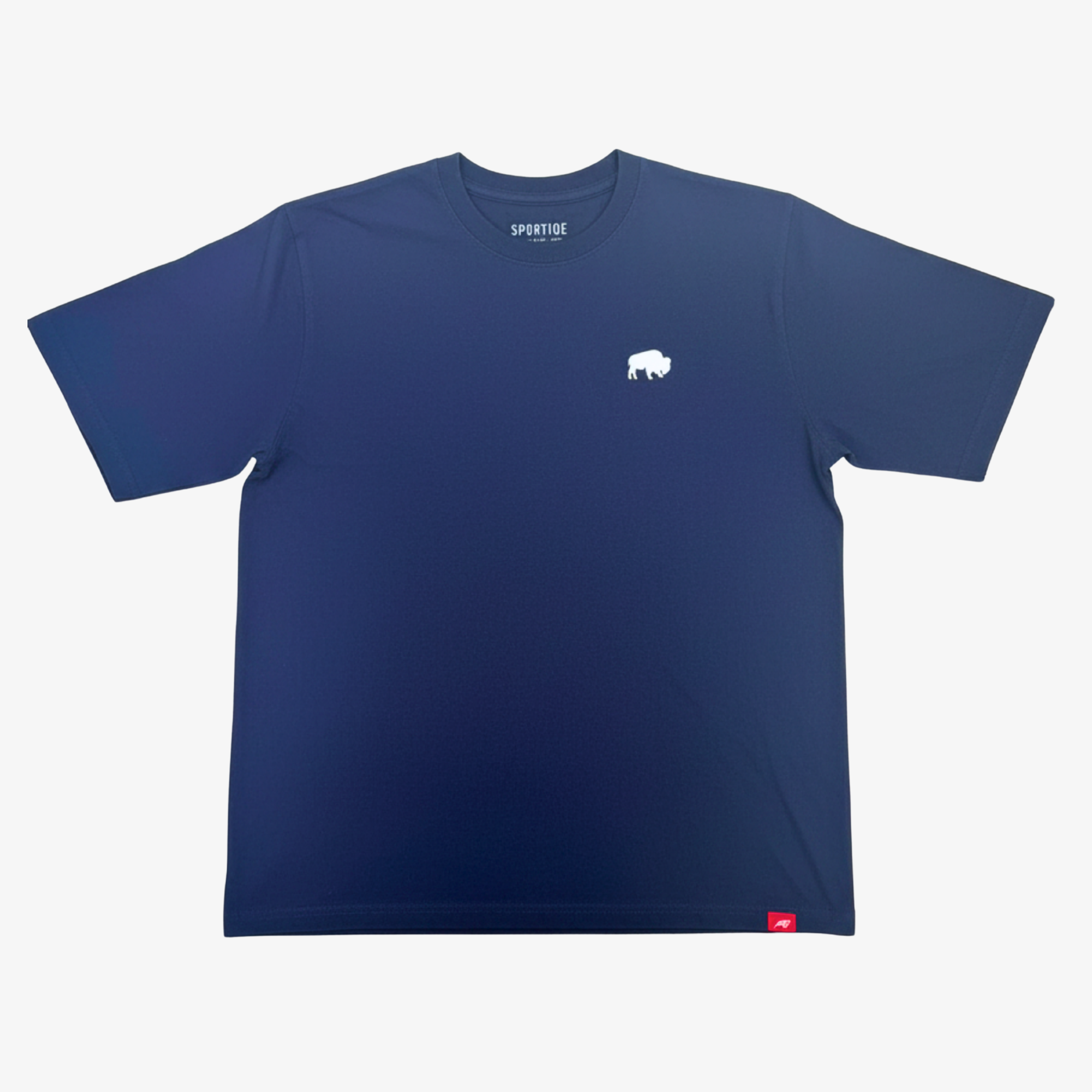 A navy blue short-sleeve crewneck t-shirt with a small white bison logo on the left chest and a small red tag near the bottom hem, displayed flat against a light gray background.