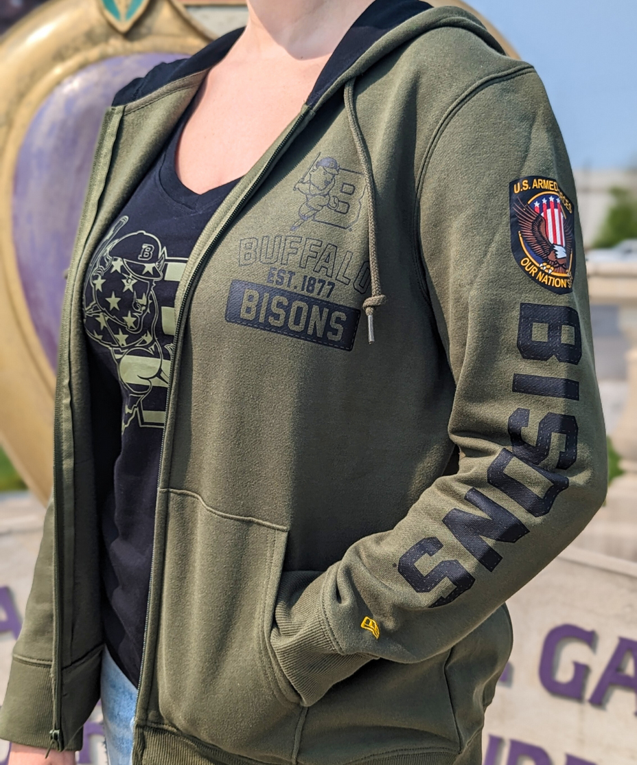 woman wearing buffalo bisons army green armed forces zip up and black buffalo bisons armed forces shirt