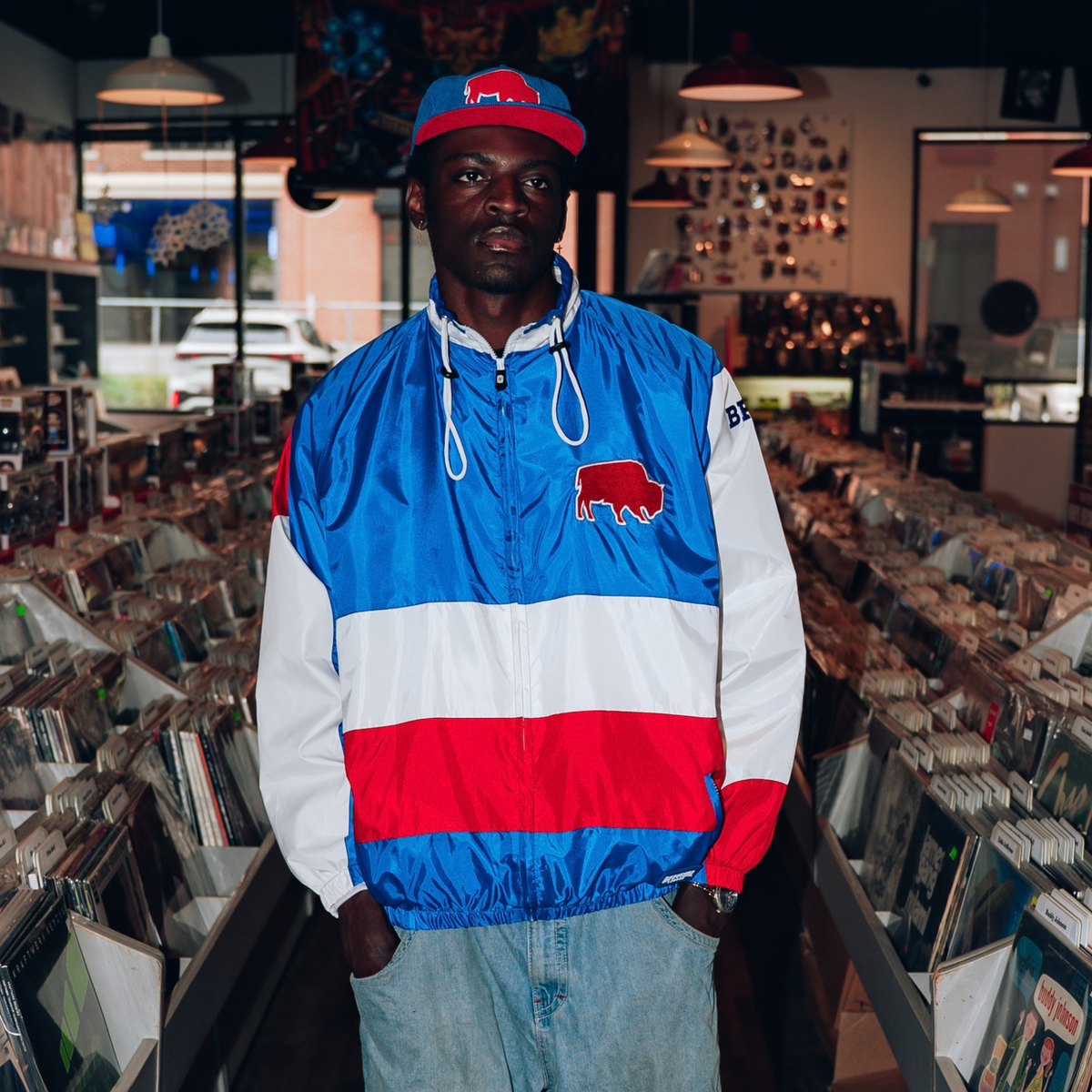The Killers x The BFLO Store royal blue, red and white chute jacket with standing buffalo patch and zippered front