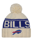 Youth New Era Bills 2024 Sideline Cream Knit Pom with bills wordmark and embroidered primary logo