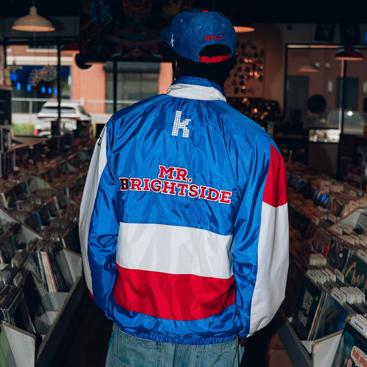 The Killers x The BFLO Store color-blocked chute jacket with MR. BRIGHTSIDE lettering and K emblem on back