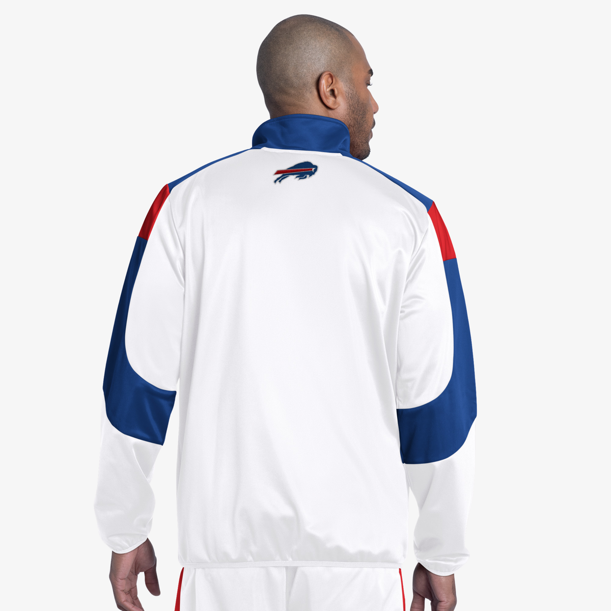 Back view of G-III Buffalo Bills white track jacket featuring royal blue and red color-blocked sleeves and a small charging buffalo logo below the collar.
