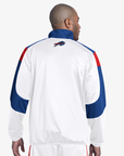Back view of G-III Buffalo Bills white track jacket featuring royal blue and red color-blocked sleeves and a small charging buffalo logo below the collar.