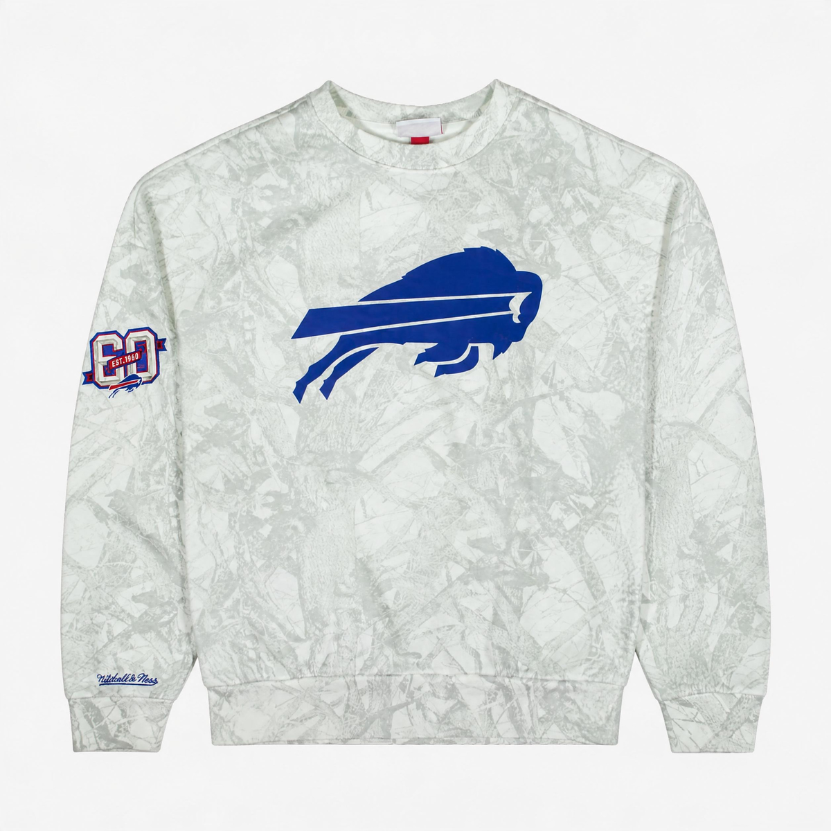 Mitchell &amp; Ness Buffalo Bills Ghosted Camo Crewneck Sweatshirt in white and light gray camouflage with large royal blue charging buffalo logo and 1960 sleeve patch.