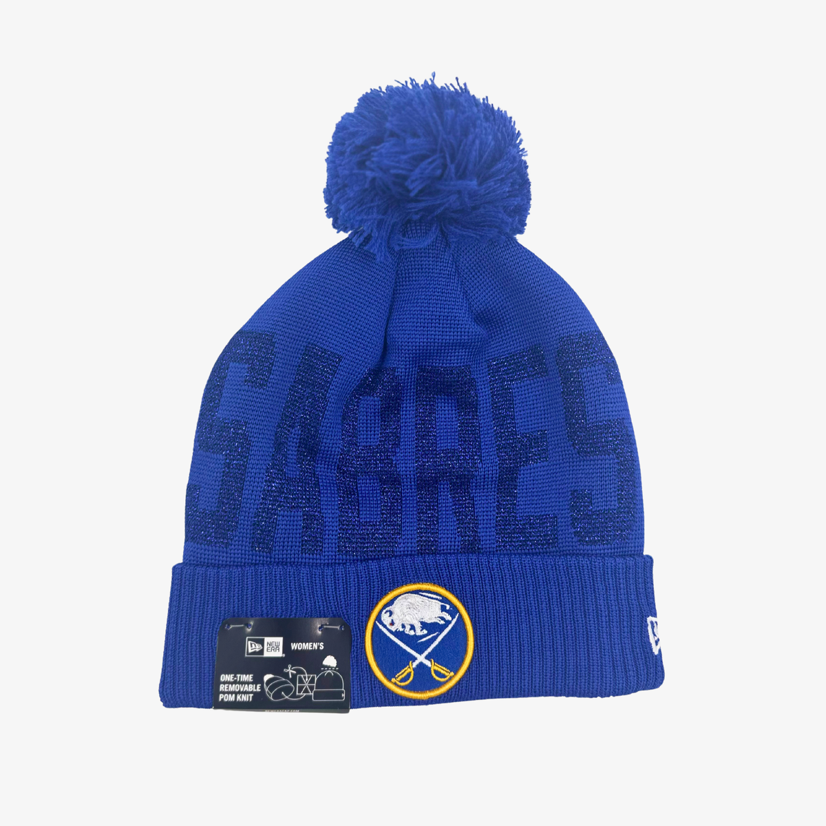 New Era Women's Buffalo Sabres royal blue pom knit hat featuring shimmering SABRES lettering, embroidered crossed-swords logo, and matching blue pom.