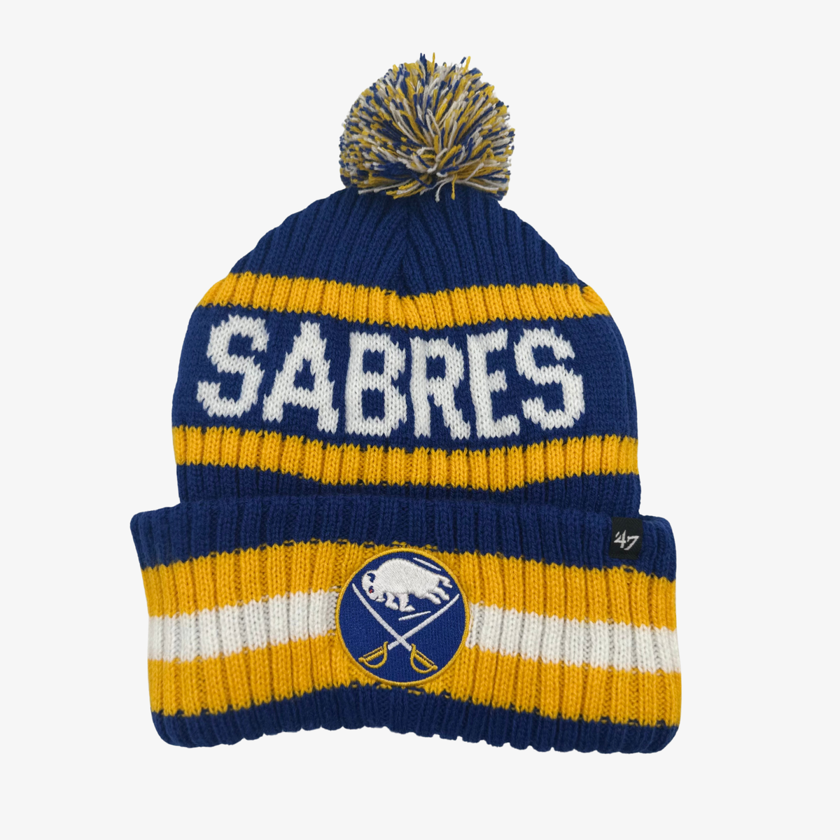 '47 Brand Buffalo Sabres navy blue pom knit hat featuring white SABRES lettering, gold stripes, embroidered crossed-swords logo, and multicolored pom.