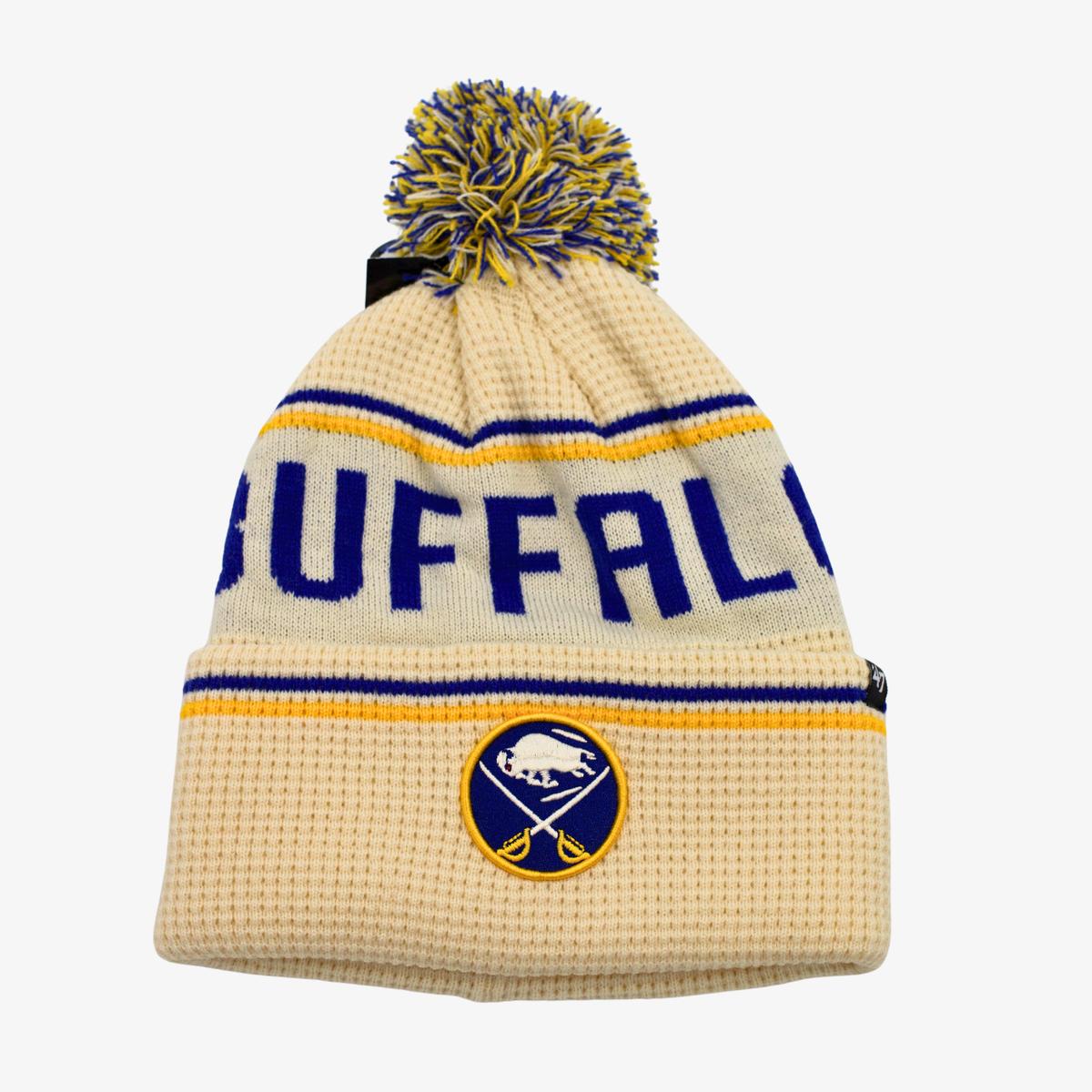 '47 Brand Buffalo Sabres cream pom knit hat with Buffalo lettering and embroidered team logo