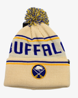 '47 Brand Buffalo Sabres cream pom knit hat with Buffalo lettering and embroidered team logo