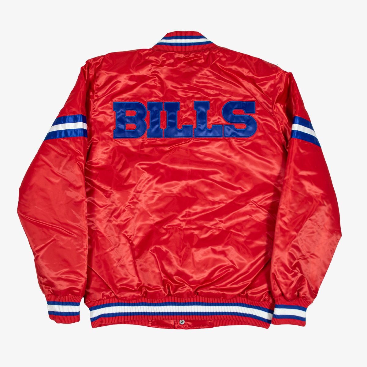 Back view of Starter Buffalo Bills red satin varsity jacket featuring oversized royal blue BILLS lettering, blue and white sleeve stripes, and matching rib-knit collar, cuffs, and waistband.
