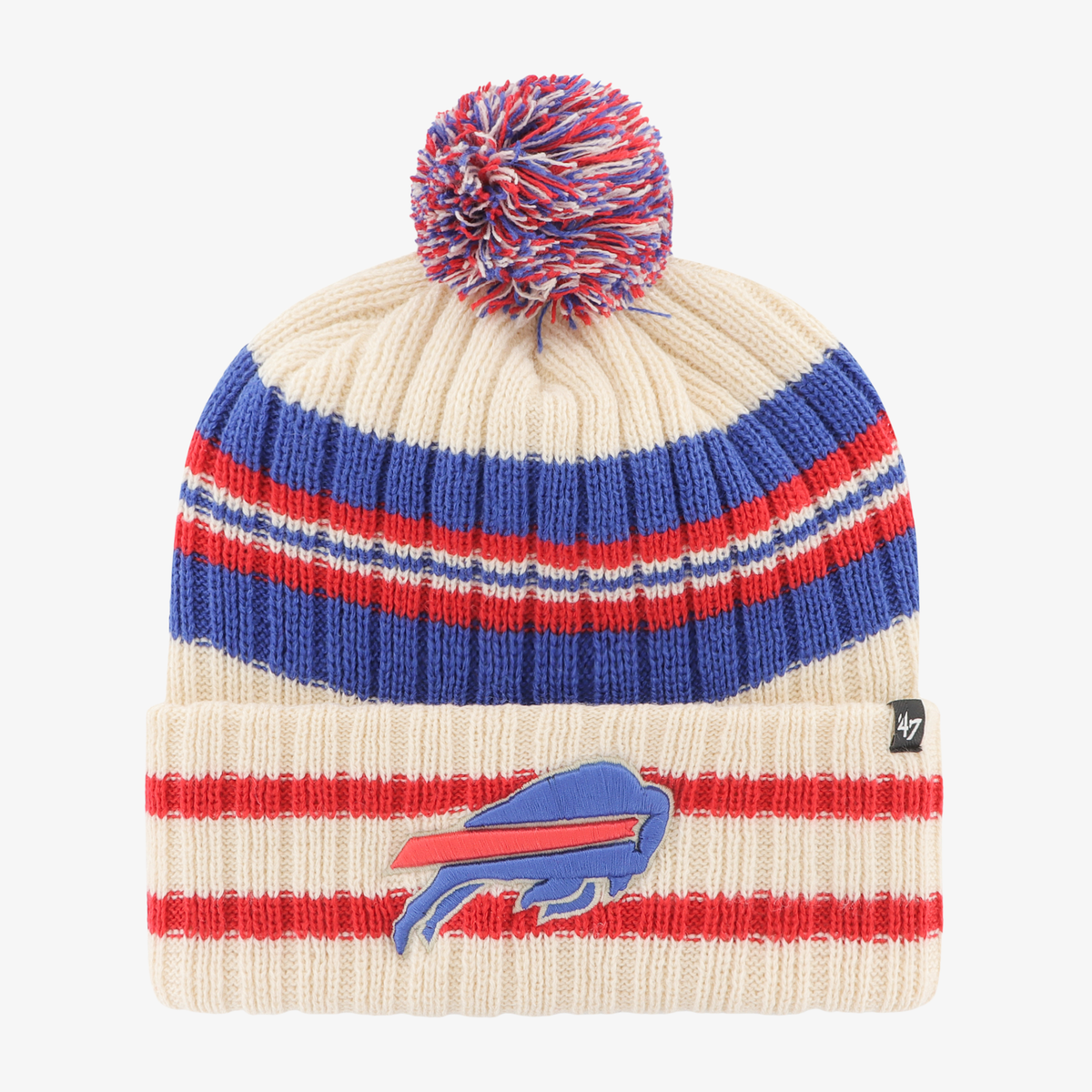 '47 Brand Buffalo Bills cream knit pom hat featuring royal blue and red horizontal stripes, embroidered charging buffalo logo on striped cuff, and multicolored yarn pom.