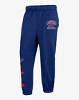 '47 Brand women's royal blue Buffalo Bills jogger sweatpants featuring Buffalo Bills lettering and logo on the upper leg, red stars down the opposite leg, and elastic ankle cuffs.