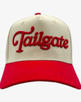 A baseball cap with an off-white crown and a bright red brim, featuring the word 'Tailgate' embroidered in red script across the front.