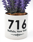 Buffalo, NY Purple Flowers With White Ceramic Pot Holder